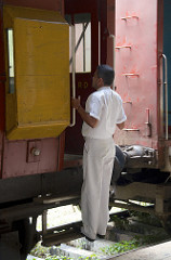 station manager checking cargo