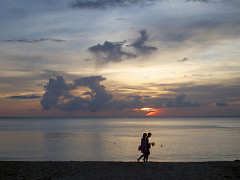 sunset on long beach in ko lanta