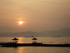 sunset with oil tanker